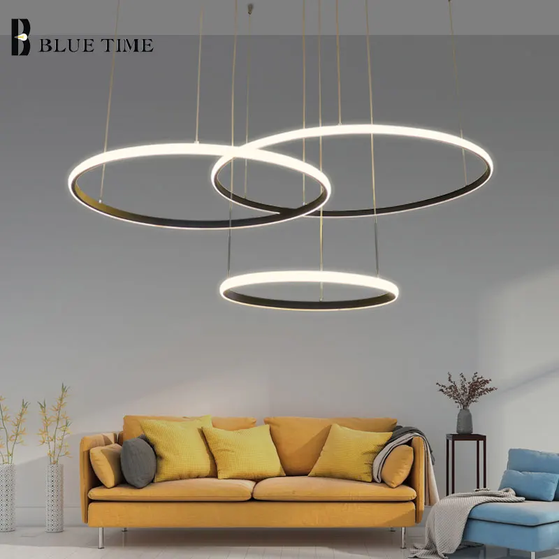 Online Nuevo diseño moderno Led araña anillos circulares para sala De estar marco blanco negro PVC Lampara De Led accesorios De iluminación para el hogar