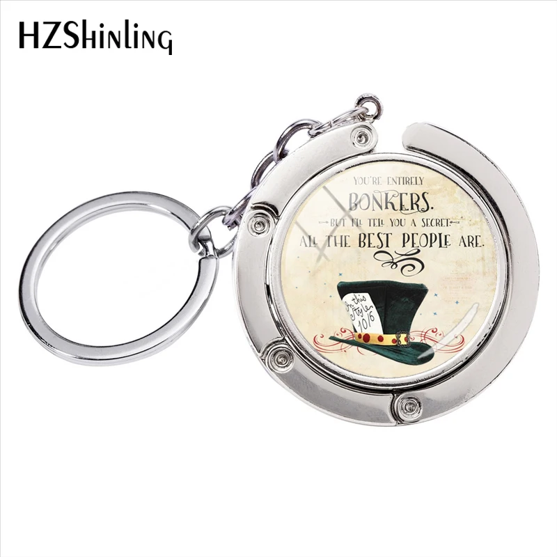 

Fashion Alice in Wonderland Quotes and Sayings Trendy Glass Round Cabochon Art Photos Bag Hanger Keychain