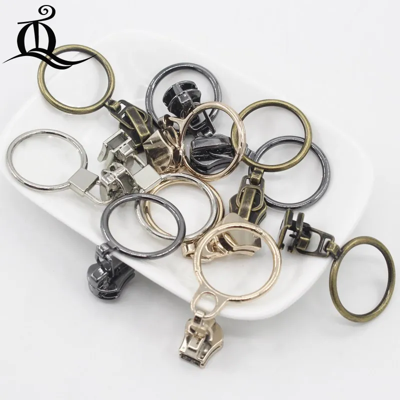 

5ps 5# circle pattern gold black silver zipper pull head for Metal zipper slider,cloth,Garment,bag and suitcase accessories