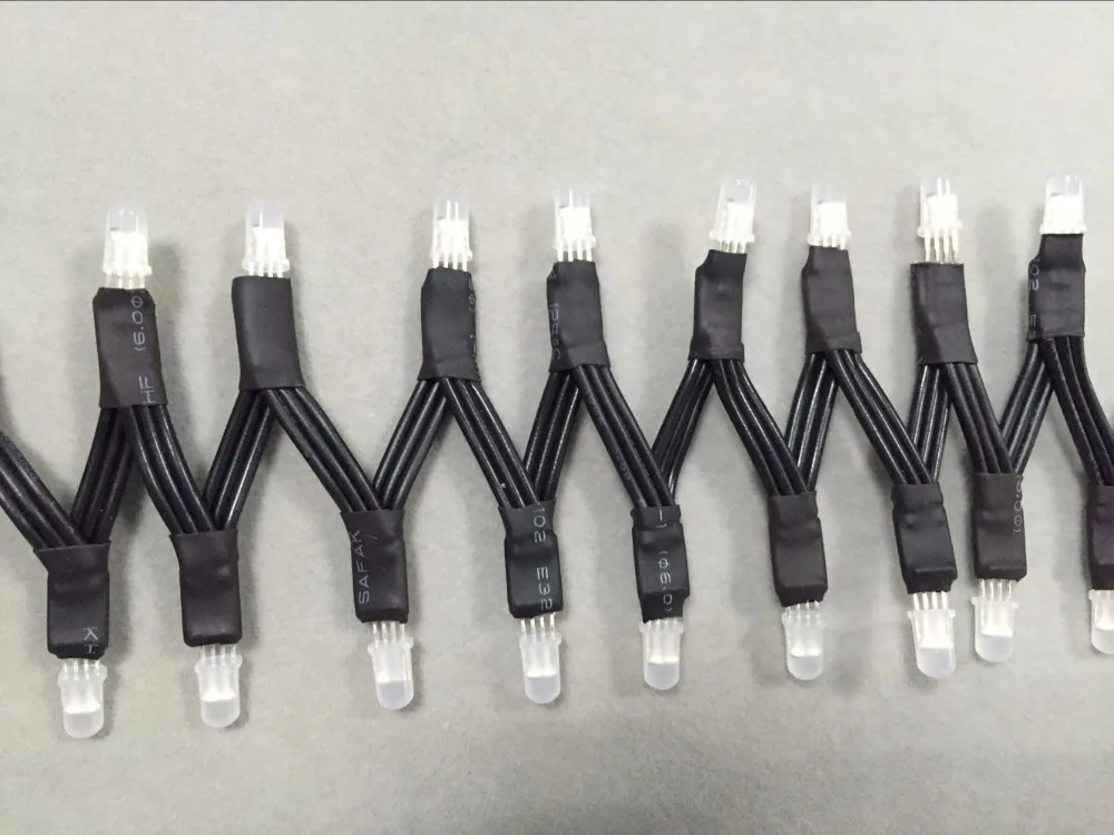 

100pcs/string addressable PL9823-F5 led string;DC5V input;3cm wire spacing;with all black wire;RGB full color