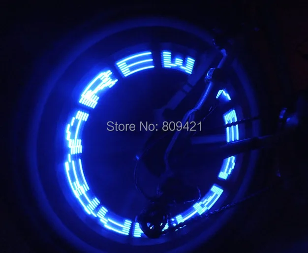 Discount WholeSale 500pcs/lot Shock and light senser double -sided transform letter Bike Wheel lights Valve Cap light 7LED Free Shipment 2