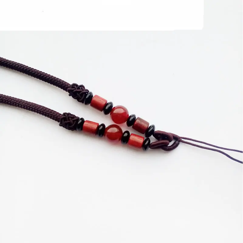 

original design the rope with red agate and wood can use pendant