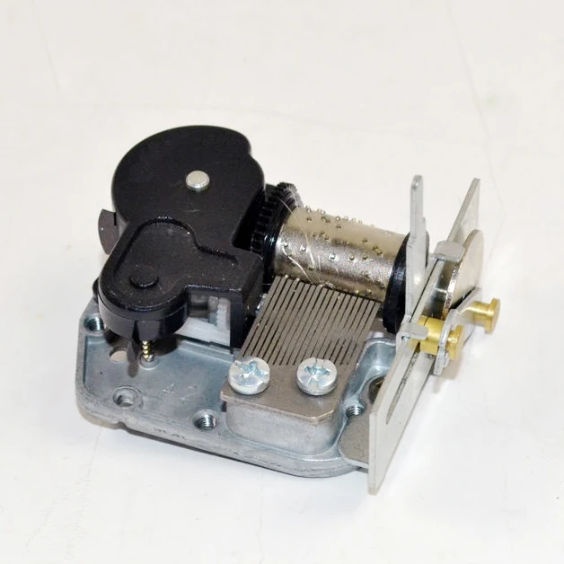 

DIY music box mechanism with parallel glide device