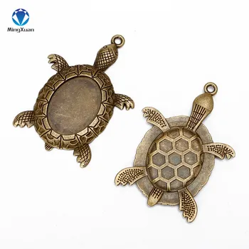 

MINGXUAN 10pcs tortoise Antique Bronze filigree cameo cabochon pendant setting Fit 18*25mm dia Cabochon Base
