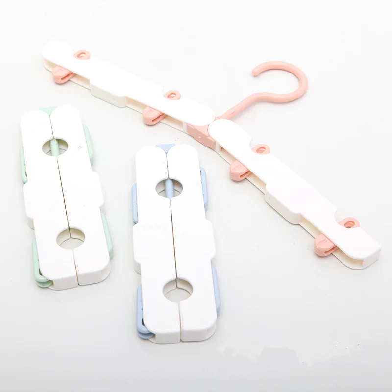 3pcs New Portable folding hanger with sock clips Magic Stretch Clothing