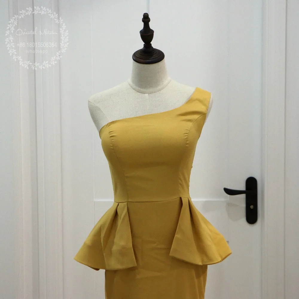 Abito cocktail oro africa