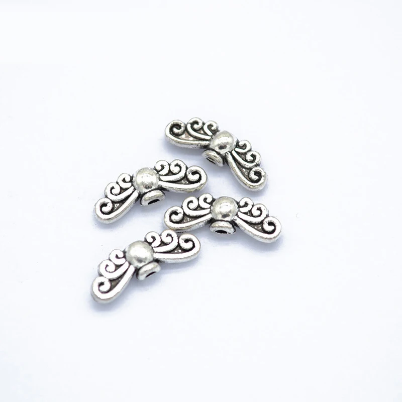 

30pcs/lot Vintage Wing Charms Hole Beads DIY Pendant Necklace Bracelet Connect Rope Wire Beads Jewelry Accessories Findings