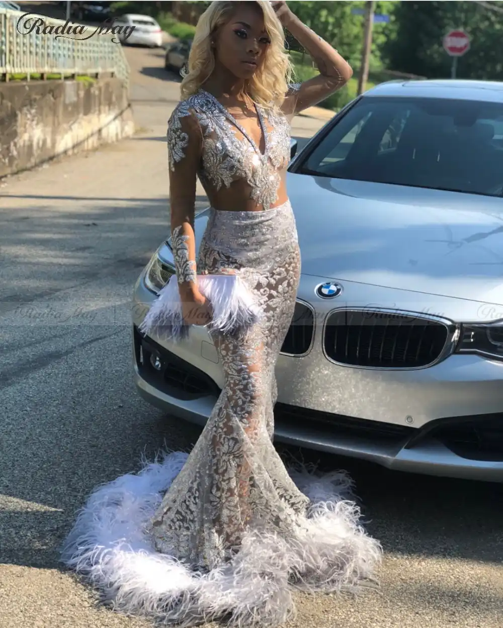 silver prom dress with feathers