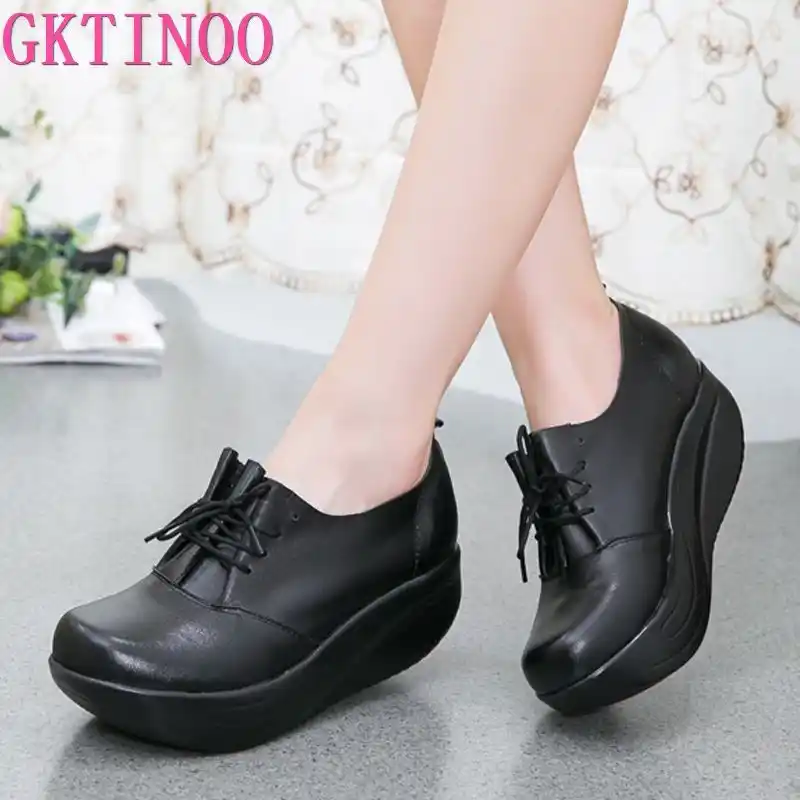 black leather platform slip ons