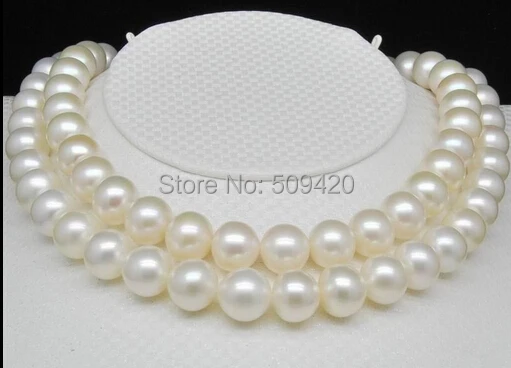 

Free Shipping >>Natural 9-10mm AAA white Fresh water pearl necklaces 32