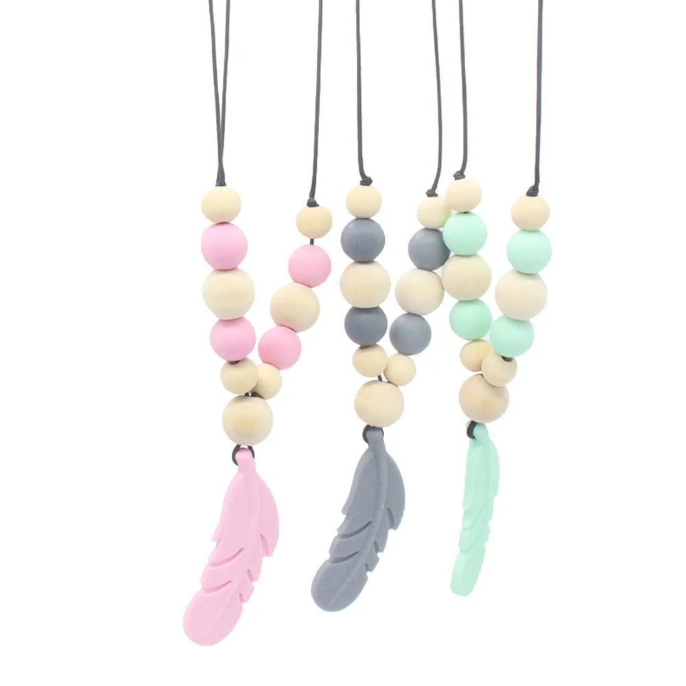 

Silicone Training Baby Teether Necklace Feather Pendant Necklace Chewing Toy Baby Teething Toy