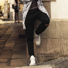 Мужские Новые Модные свободные рваные штаны с дырками, мужские брюки для бега с эластичной резинкой на талии, мужские повседневные хлопковые брюки, качественный карандаш