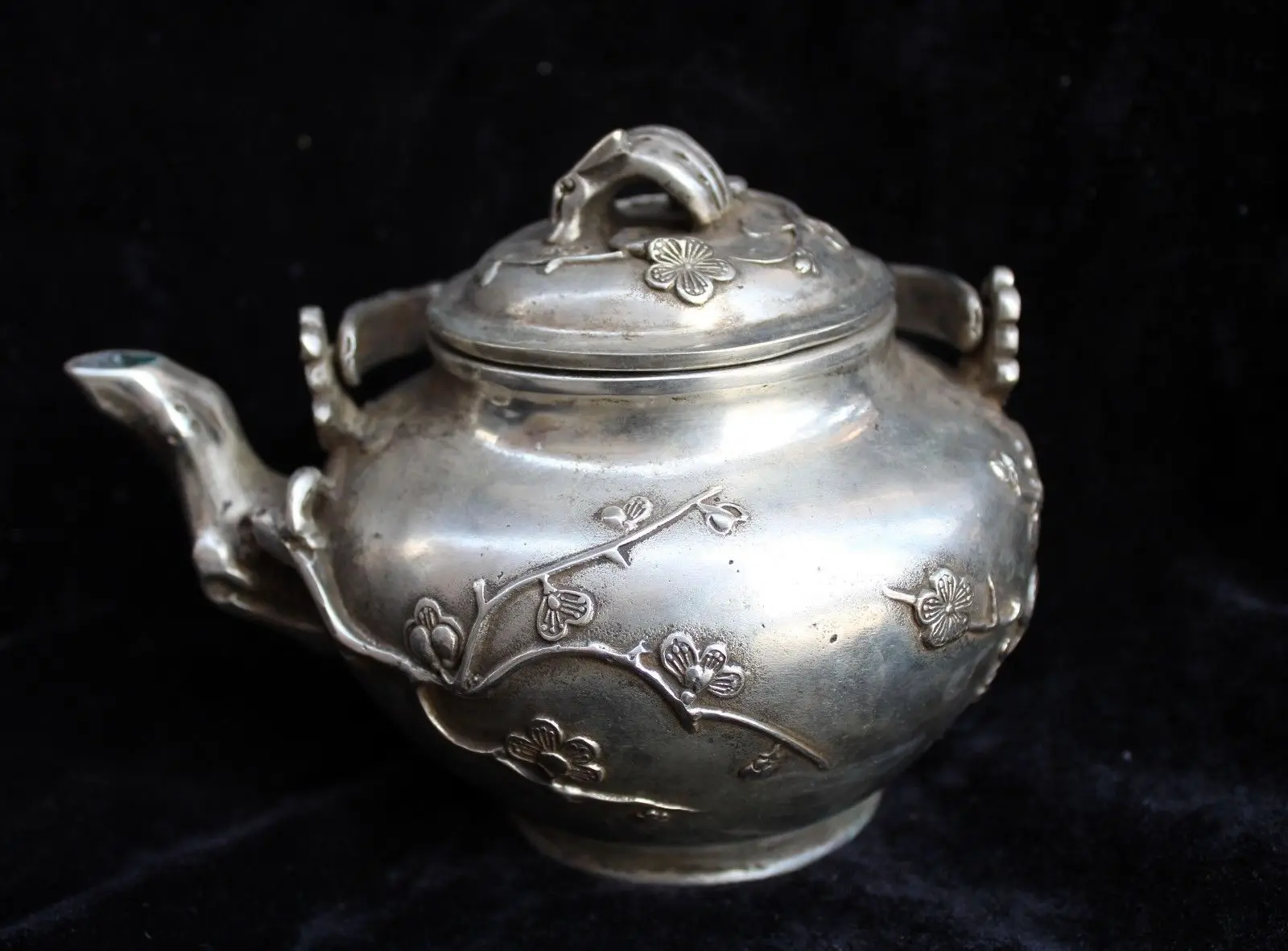 

Marked old Chinese Dynasty Silver Auspicious Plum Blossom Wine TeaPot Flagon