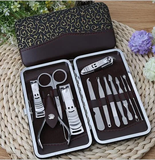 

DHL shipping 12 in 1 set Nail Care Set Pedicure Scissor Tweezer Knife Ear pick Utility Manicure Tools Nail Clipper Kit jk17