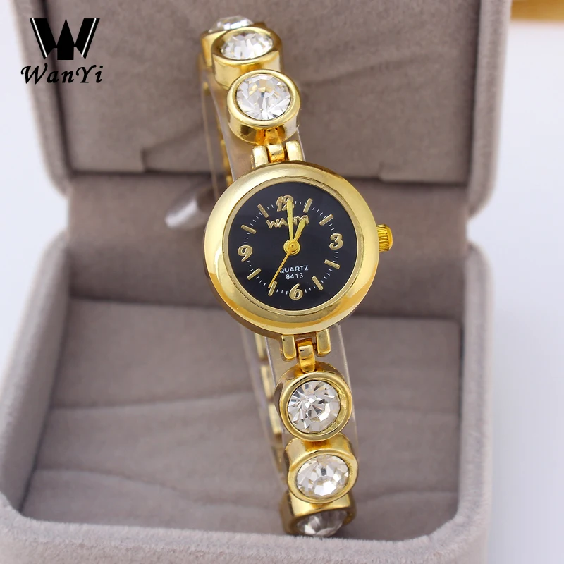 Wanyi Luxury Golden Women Wrist Watches Big Crystal Steel Quartz Ladies