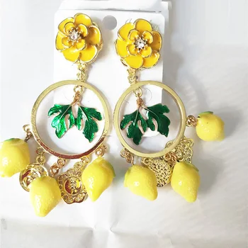 

Retro Fashion Hollow Leaf Tassel Earrings Long Big Hanging Luxury Vintage Big Yellow Water Drop Earrings For women