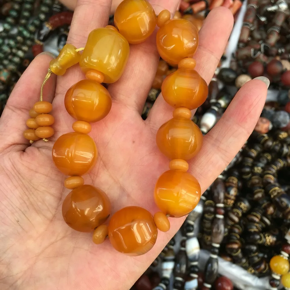 

The ancient Tang and six edge yellow agate beads Tang Gu six edge hand on sixth turbo rib yellow Agate Bracelet