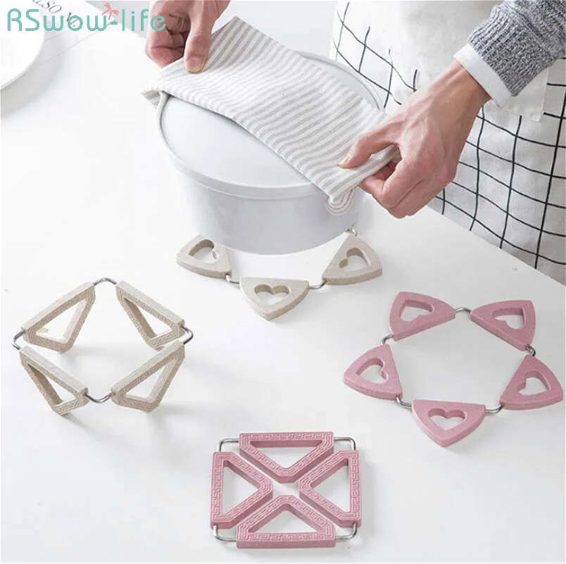 

Foldable Anti Scalding Household Plastic Plate Rotary Creative Anti-Skid Heat Insulation Pot Table Kitchen Insulation Mat Europe