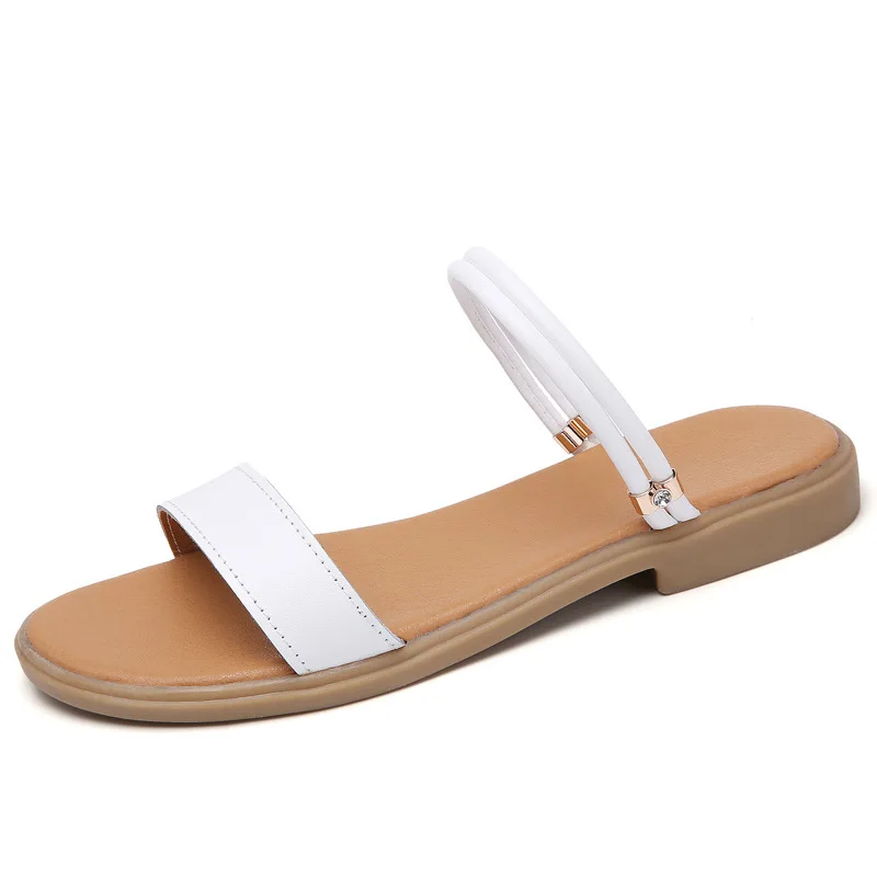 

2019 summer new solid color round head flat with casual sandals hollow rhinestone flat shoes two women's sandals