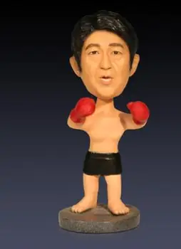 

Japanese prime minister shinzo Abe shakes his head in a boxing match legendary resin handicraft personal sculpture crafts statue