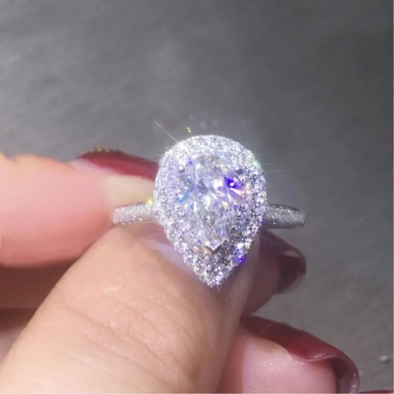 

Small exaggerated female models simulation pink diamonds with teardrop shaped wedding marriage diamond ring cute wind hot ring