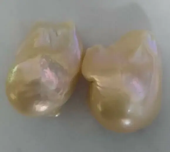

a pair of 25mm natural south sea gold pink pearl earrings