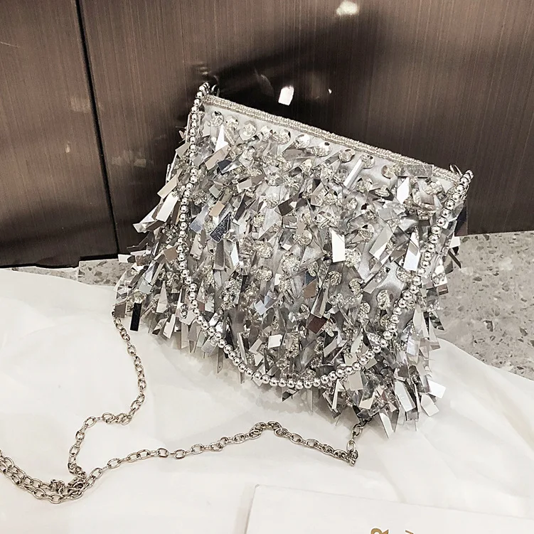

Retro silver flash flash flash flash flash Flash hand single shoulder pack 2019 new cross-ramp chain dinner hand bag tide