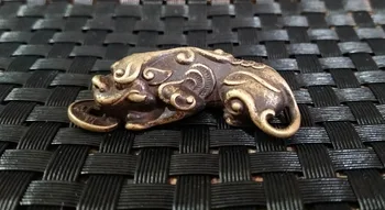 

Copper animal hanger invites money to exorcise evil