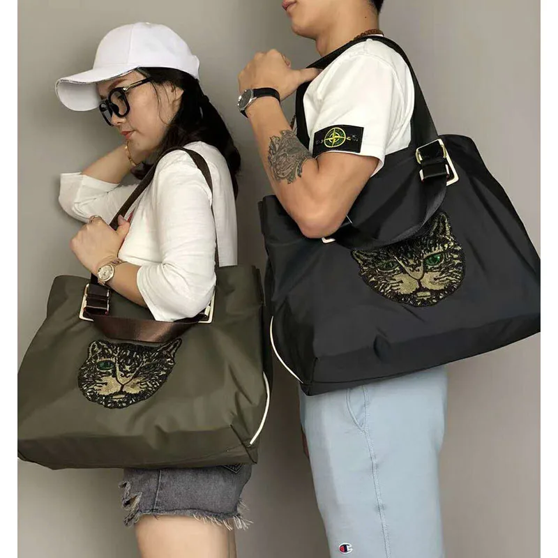 

Unisex new embroidered waterproof Oxford shoulder bag animal pattern portable big bag short-distance travel bag luggage bag tide