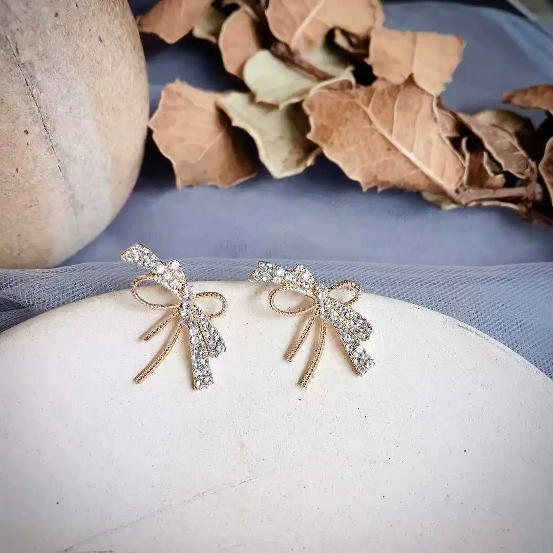 

Light shining zircon gentle temperament bowknot girl luxury elegant Japanese earrings sweet Christmas 925 silve