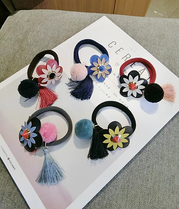 New jewelry retro color leather fringed hair ball ring Tousheng female flowers