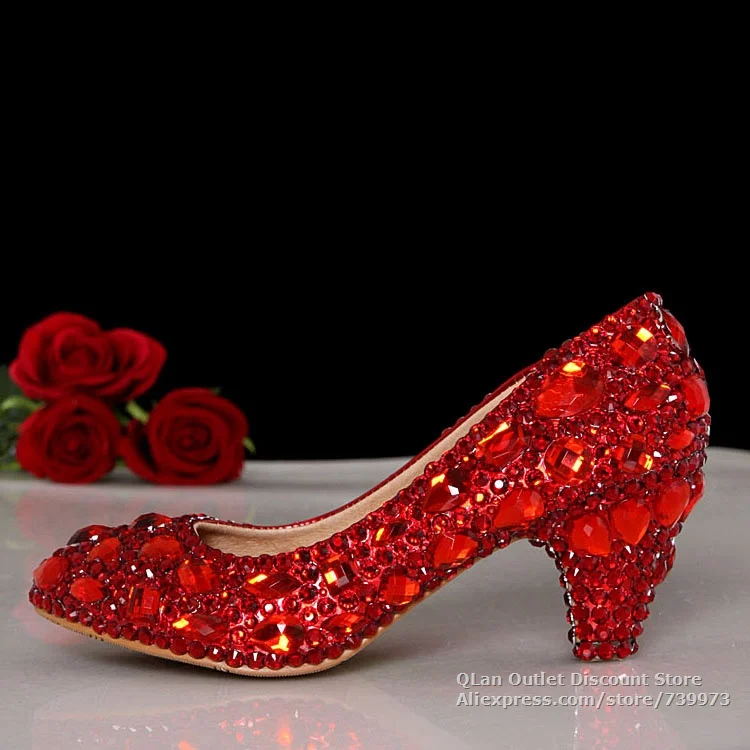 red heels and clutch bag