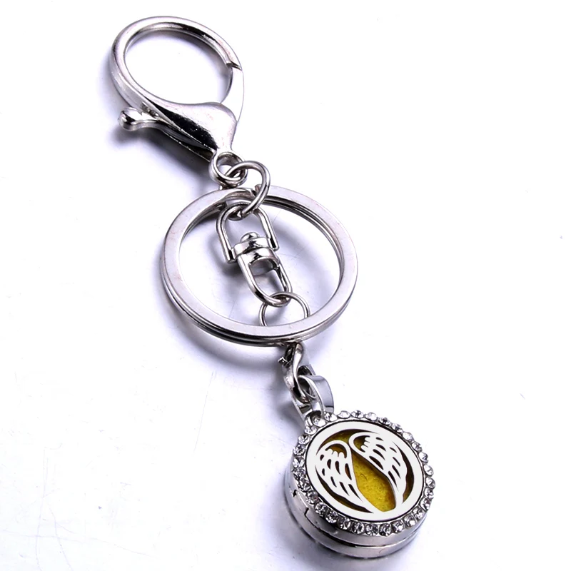 

Round 15MM Fashion Perfume KeyChain Jewelry Stainless Steel Essential Oil Diffuser Perfume Aromatherapy Locket Key Chain Jewelry
