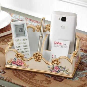 

remote control receiver box, living room table top, mobile phone sundries, storage box, tea table sorting box