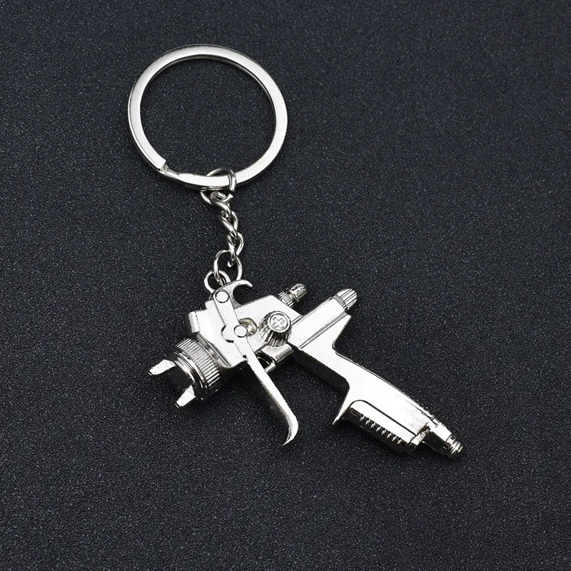 Water Spray Gun Keychain Metal Men Gift Car Key Chain Motorcycle Auto Accessories Creative Key Ring Water gun Key Cover Holder