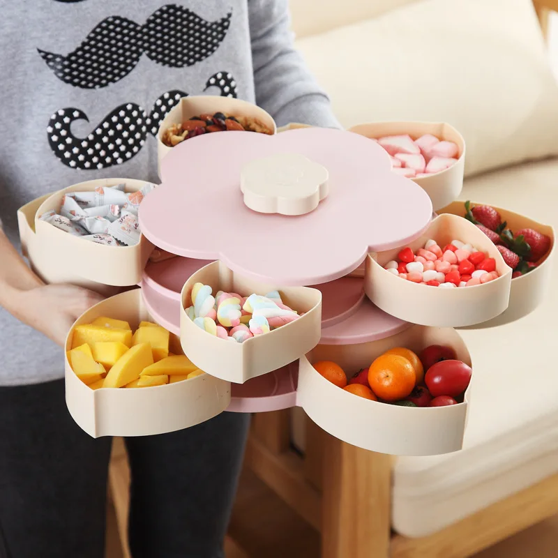 Comprar Caja de plástico giratoria en forma de pétalo para semillas de caramelo de frutos secos frutas secas caja tipo ciruela lonchera contenedor para niños proteger la fruta