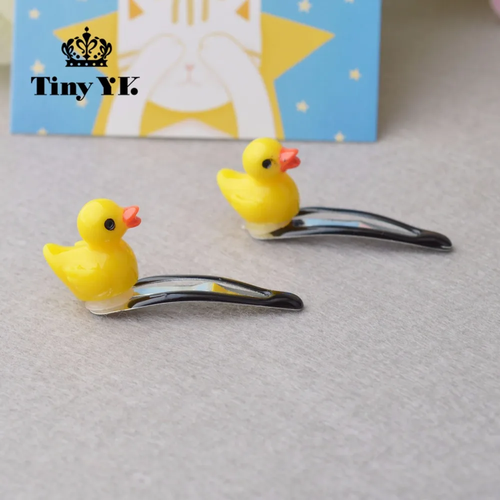 зажимы и уточки для волос. уточка для волос профессиональные. уточка с волосами. пластиковая заколка для волос. заколка уточка для волос.