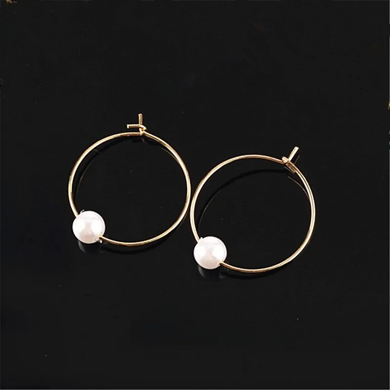 

Minimalist cos hm circle pearl ear ring earring transparent glass bead earrings earrings female restoring ancient ways