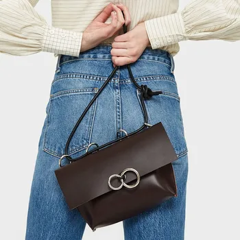 

Fashion Simple Desinger Crossbody for Women Leather Metal Ring Small Round Shoulder Messenger bag 2019 Party Clutch and Purse