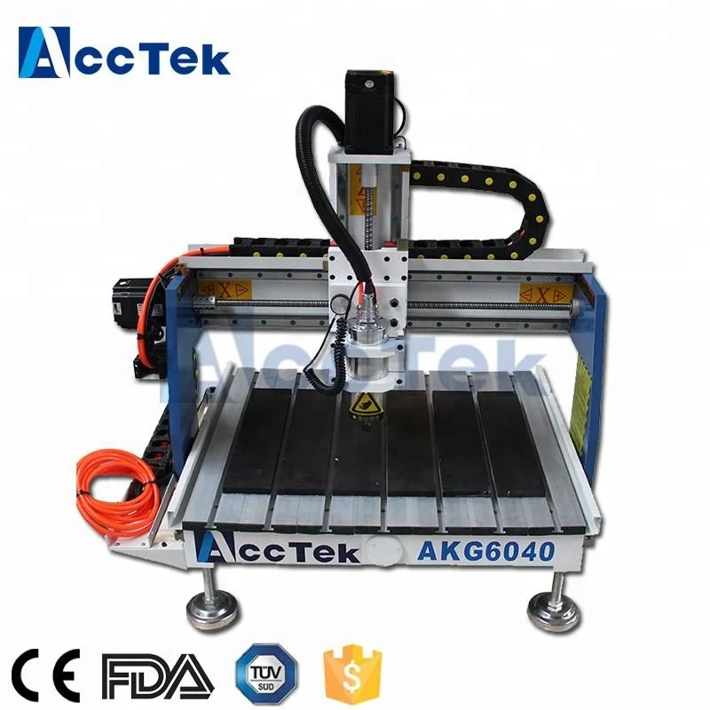 

Jinan hot sale 6040/6090 advertising mini cnc router/AccTek mni cnc router