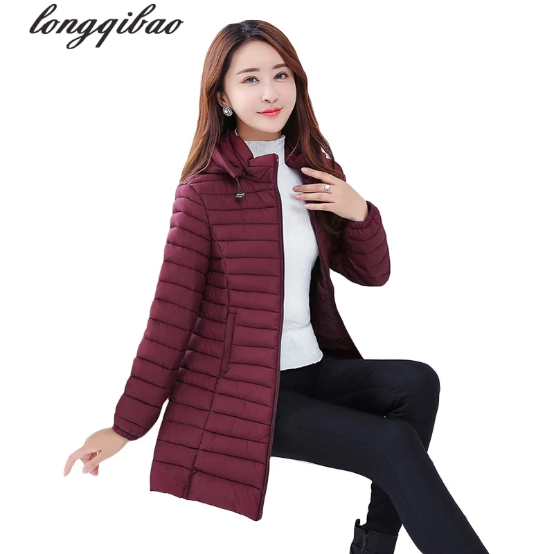 

The new autumn and winter women long section of large size thin section hooded solid color Slim Down padded jacket TB7679