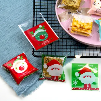 

New 50/100Pcs Christmas Santa Claus Snowman Snacks Cookie Gift Bag Plastic Packaging Bags Party Baking Favors Garland Bags
