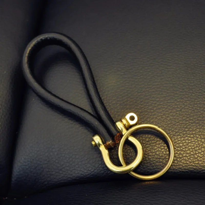 

BYCOBECY Creative Key Holder Organizer Genuine Leather Smart Key Wallet EDC Gear Keychain New Stirrup Style Vintage Pocket Ring