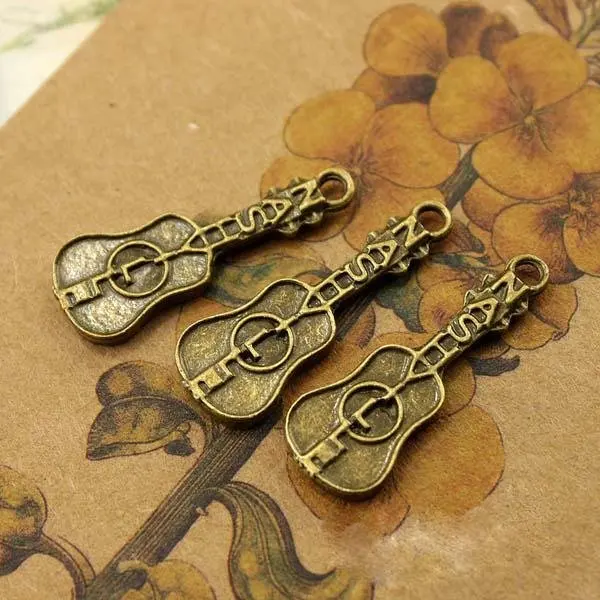 

Free shipping!!!!! New guitar Charms Pendant Bronze fit necklace 28x10mm