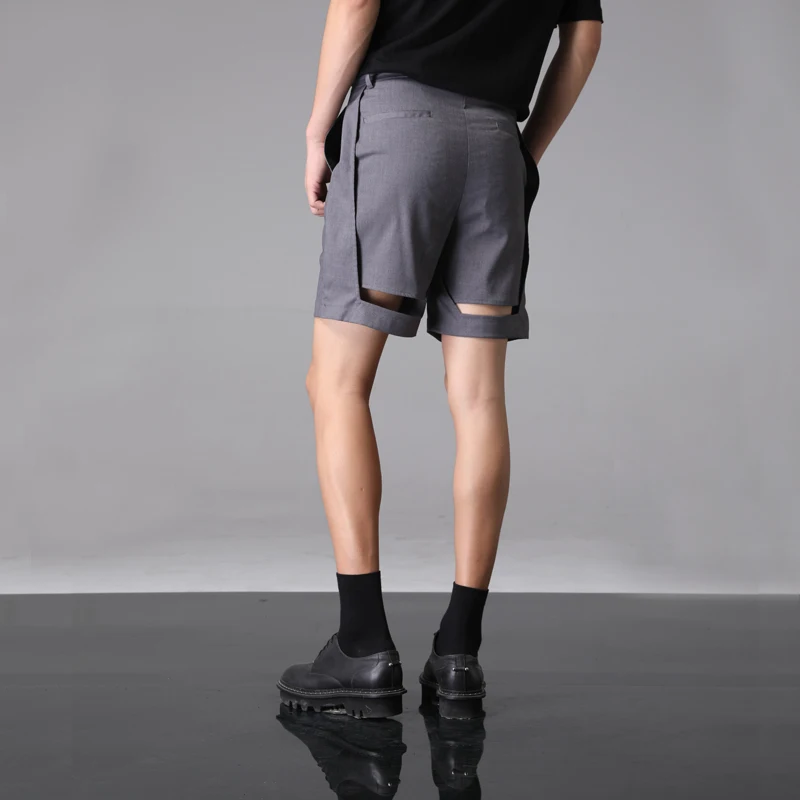 Alternative personality double hollowed out design fashionable men four British style gray suit shorts men