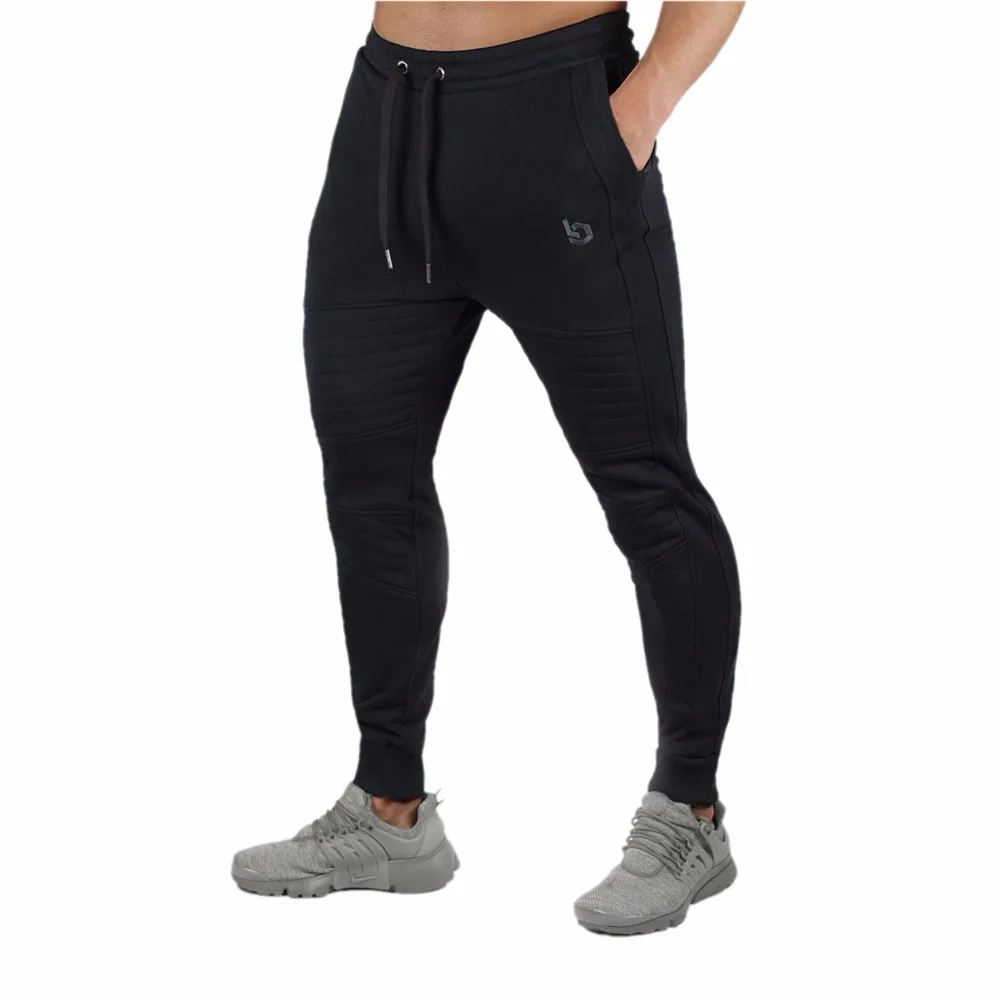 

New Brand Print logo Gyms Men Joggers Casual Men Sweatpants Joggers Pantalon Homme Trousers Sporting Clothing Bodybuilding Pants