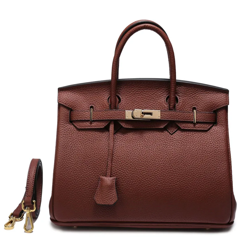 

Europe and the United States new ladies leather large-capacity lock handbags first layer leather fashion lychee shoulder bag