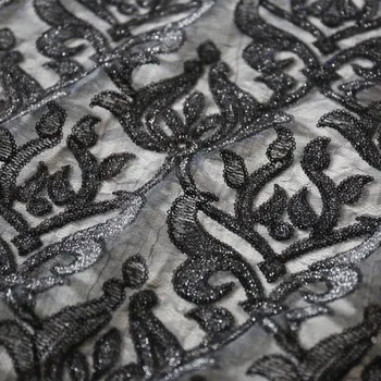 

fashion cloth embroidered artisan and elegant evening dress sequins gold and silver thread embroider dress fabrics