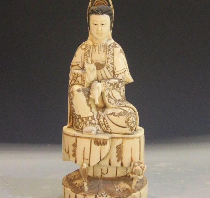 

Tibet Buddhism Cattle Bone Handmade Carved Kwan-yin Comfortable Guanyin Statue