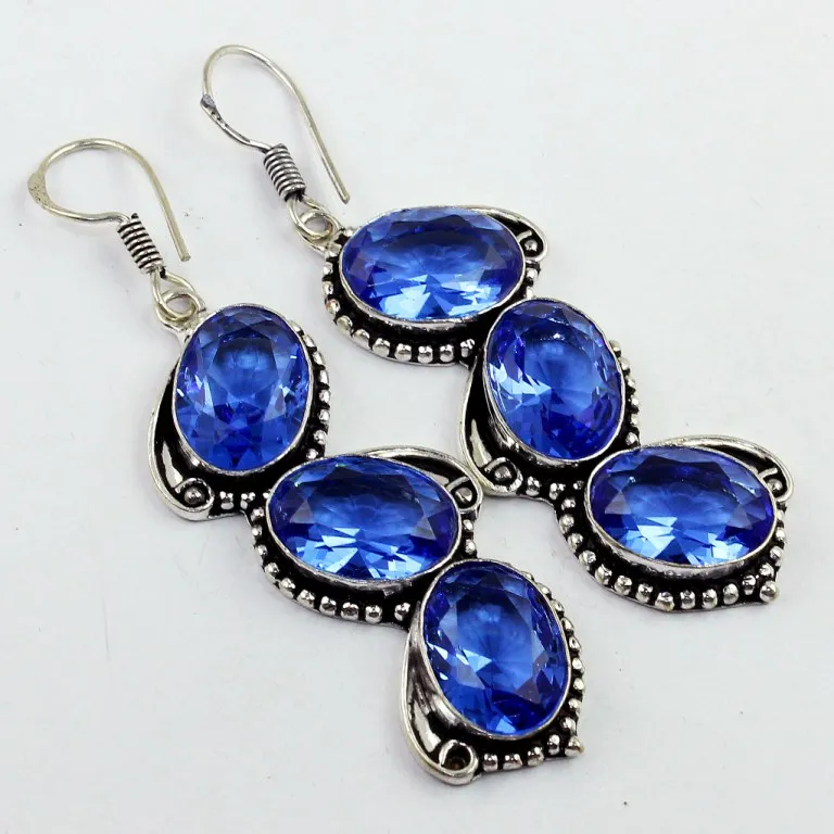 

Blue Topa Earrings Silver Overlay over Copper , 65 mm, E0052
